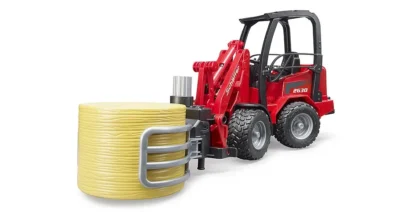 Bruder Schäffer Compact loader with bale gripper + bale
