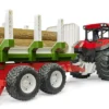 bruder roadmax tractor with forwarding trailer tree trunks 2