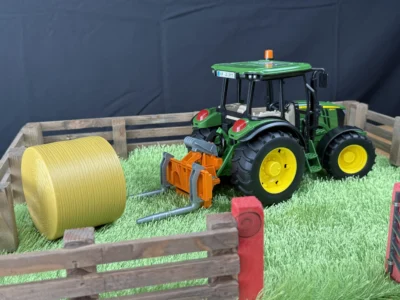 bruder tractor transport box with single bale handler round bale 31